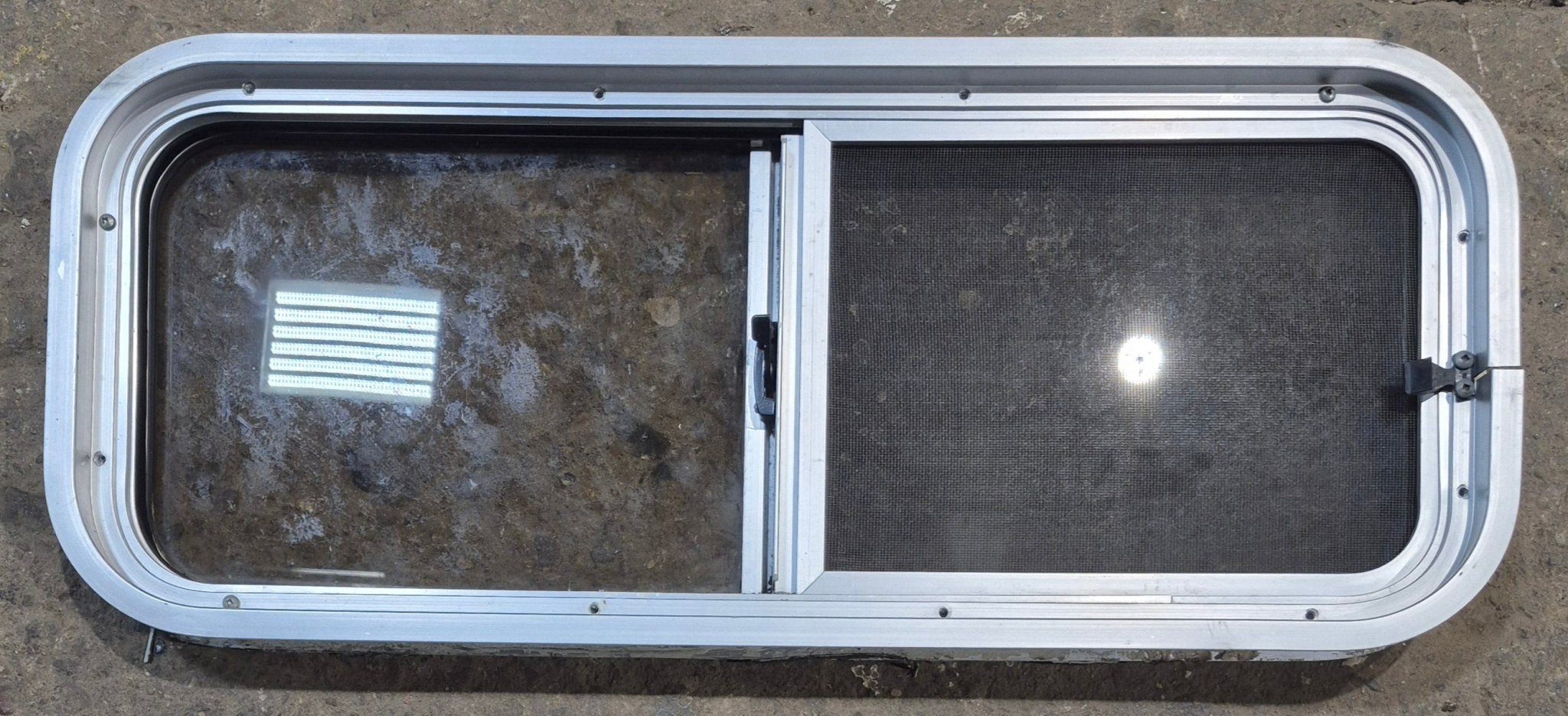 Used Silver Radius Opening Window : 30" W x 11 1/2" H x 1 3/4" D - Young Farts RV Parts