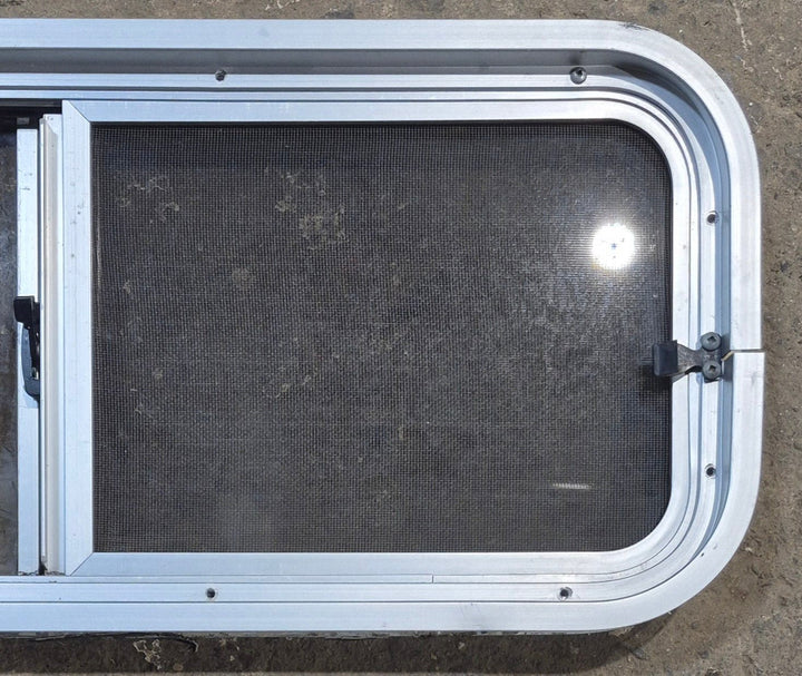 Used Silver Radius Opening Window : 30" W x 11 1/2" H x 1 3/4" D - Young Farts RV Parts