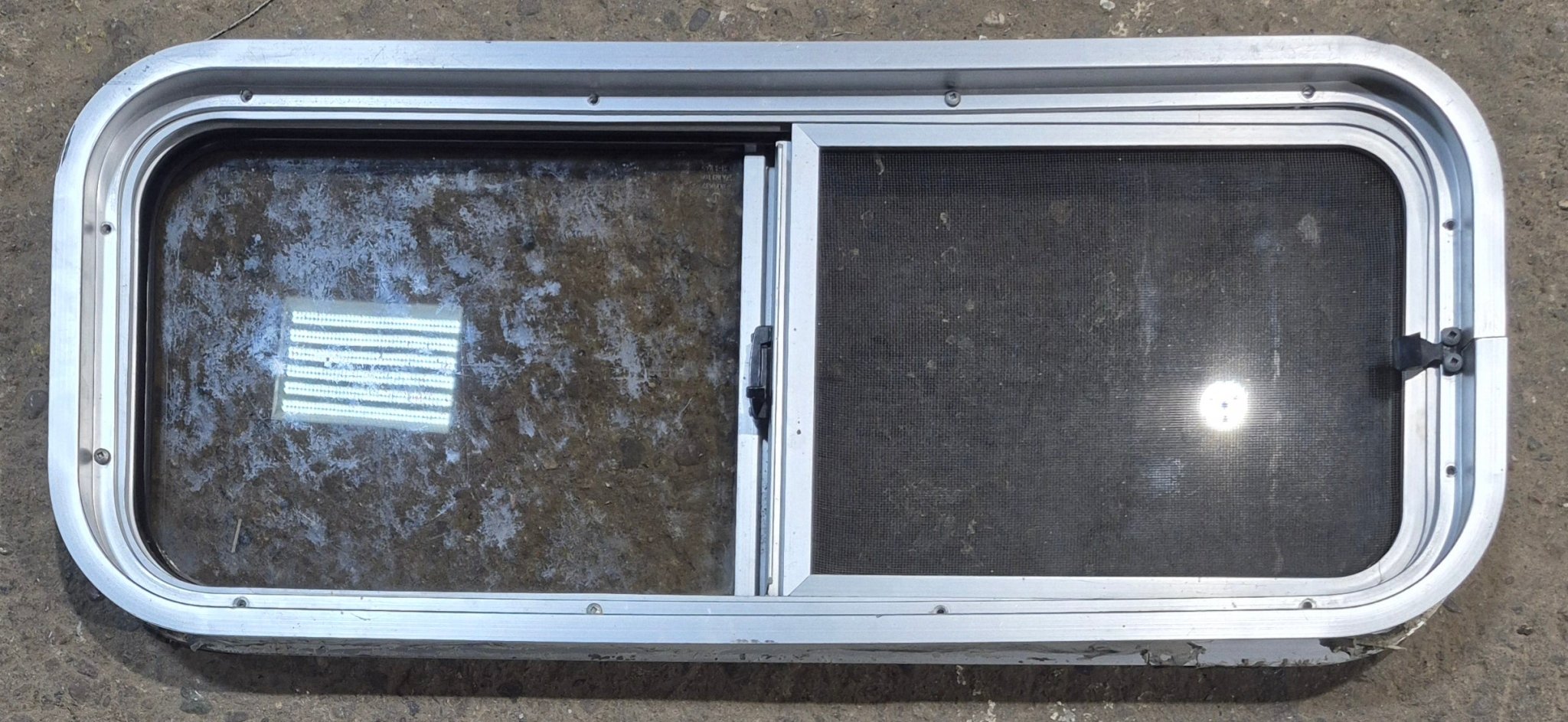 Used Silver Radius Opening Window : 30" W x 11 1/2" H x 1 3/4" D - Young Farts RV Parts