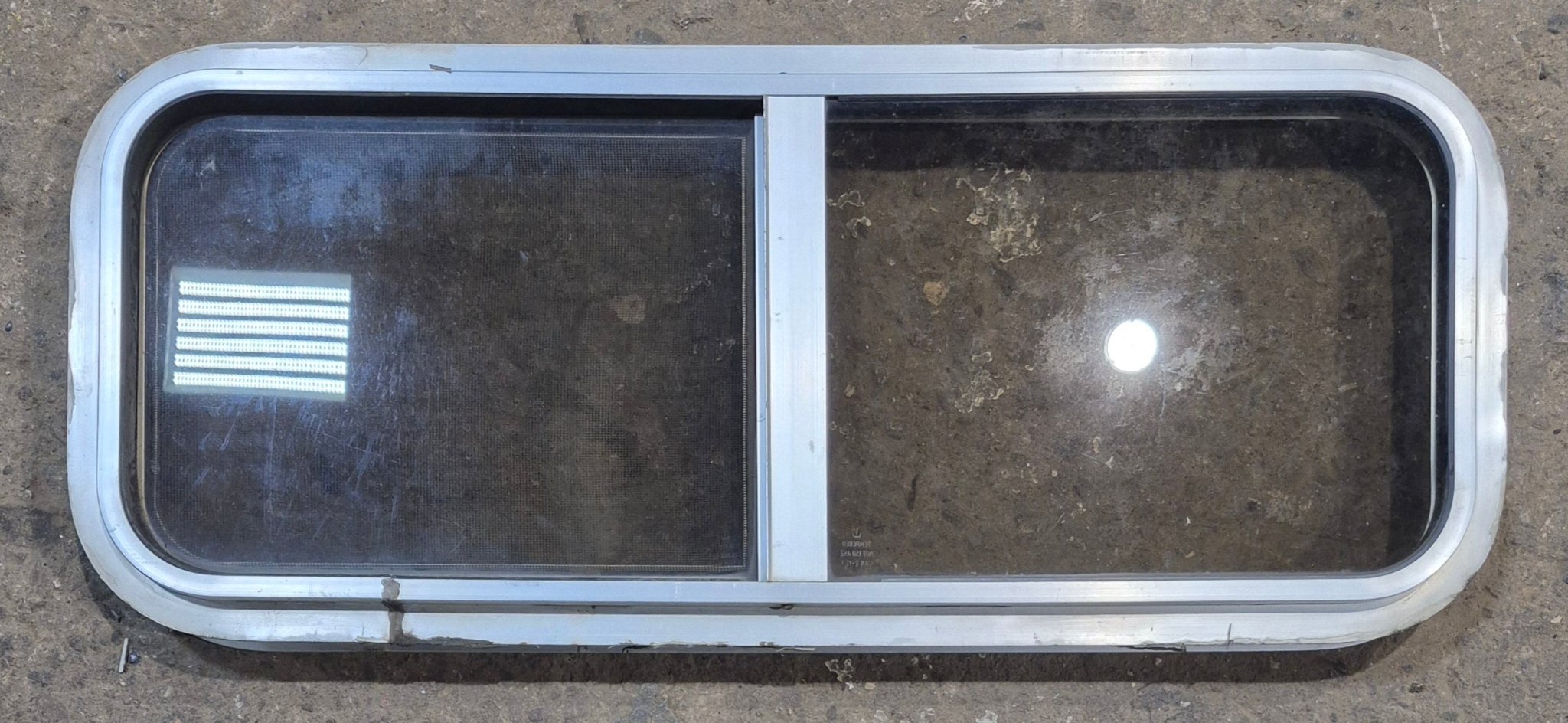 Used Silver Radius Opening Window : 30" W x 11 1/2" H x 1 3/4" D - Young Farts RV Parts