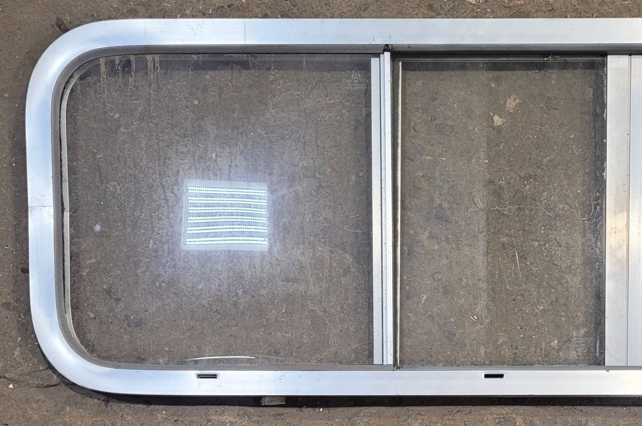 Used Silver Radius Opening Window : 51" W x 14 1/4" H x 1" D - Young Farts RV Parts