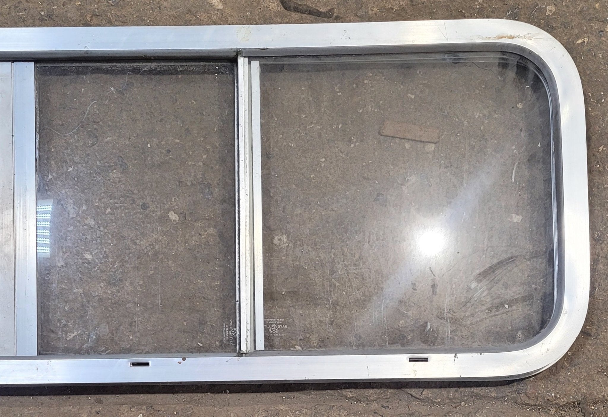 Used Silver Radius Opening Window : 51" W x 14 1/4" H x 1" D - Young Farts RV Parts