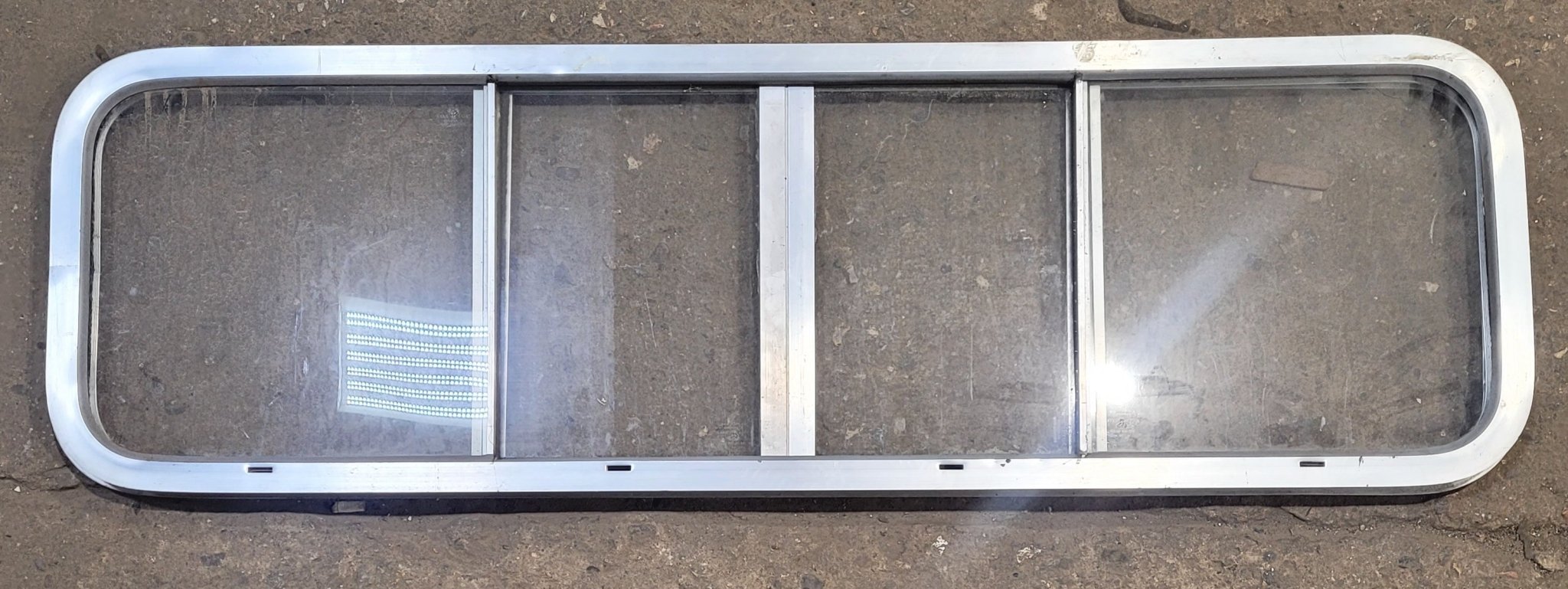 Used Silver Radius Opening Window : 51" W x 14 1/4" H x 1" D - Young Farts RV Parts