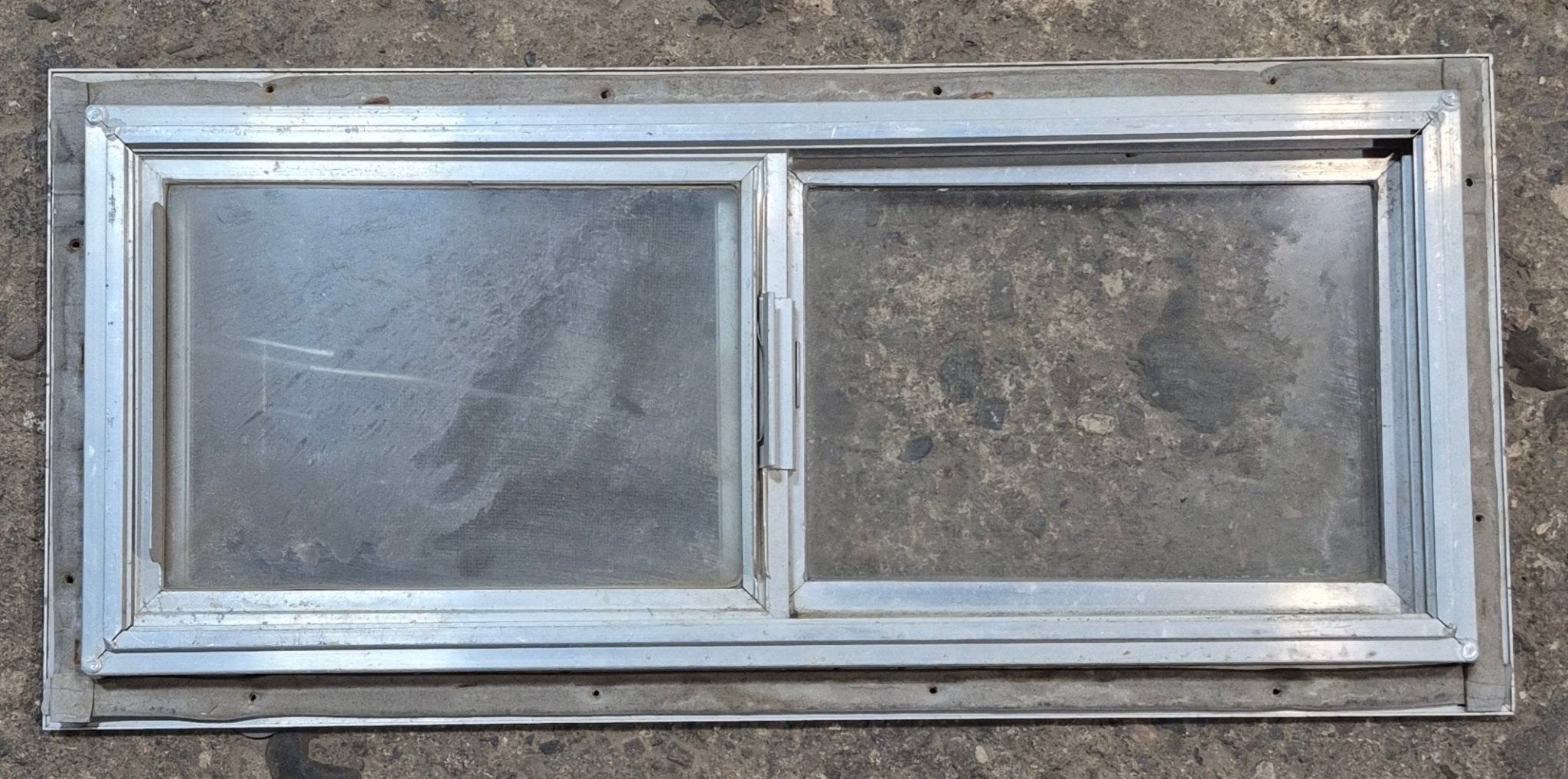 Used Silver Square Opening Window: 24" W x 10" H x 7/8" D - Young Farts RV Parts
