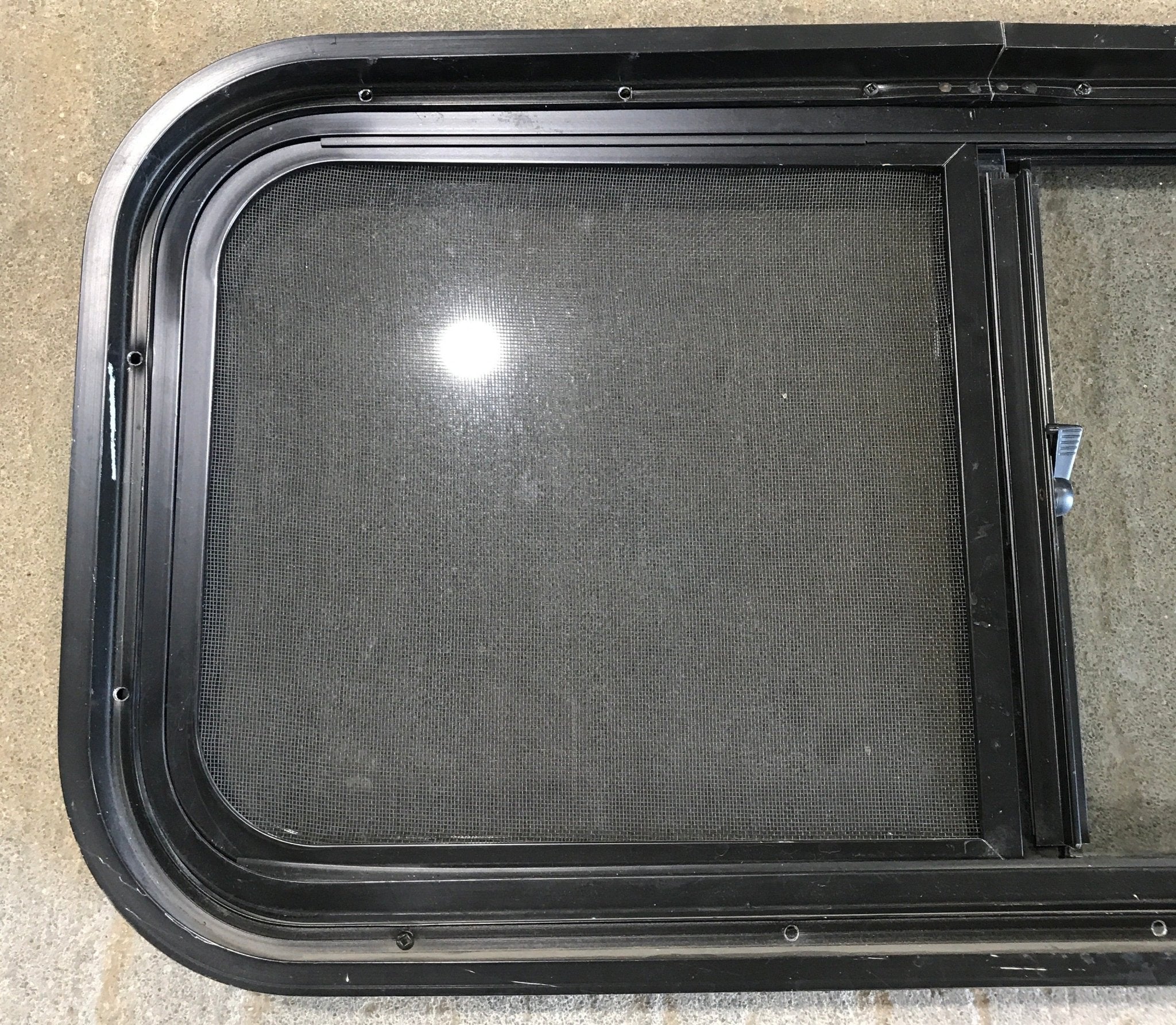 Used Slanted Black Radius Opening Window : 36 3/4" W x 13 1/2" H x 2" D - Young Farts RV Parts
