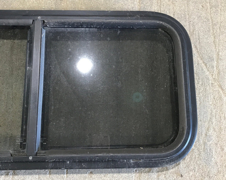 Used Slanted Black Radius Opening Window : 36 3/4" W x 13 1/2" H x 2" D - Young Farts RV Parts