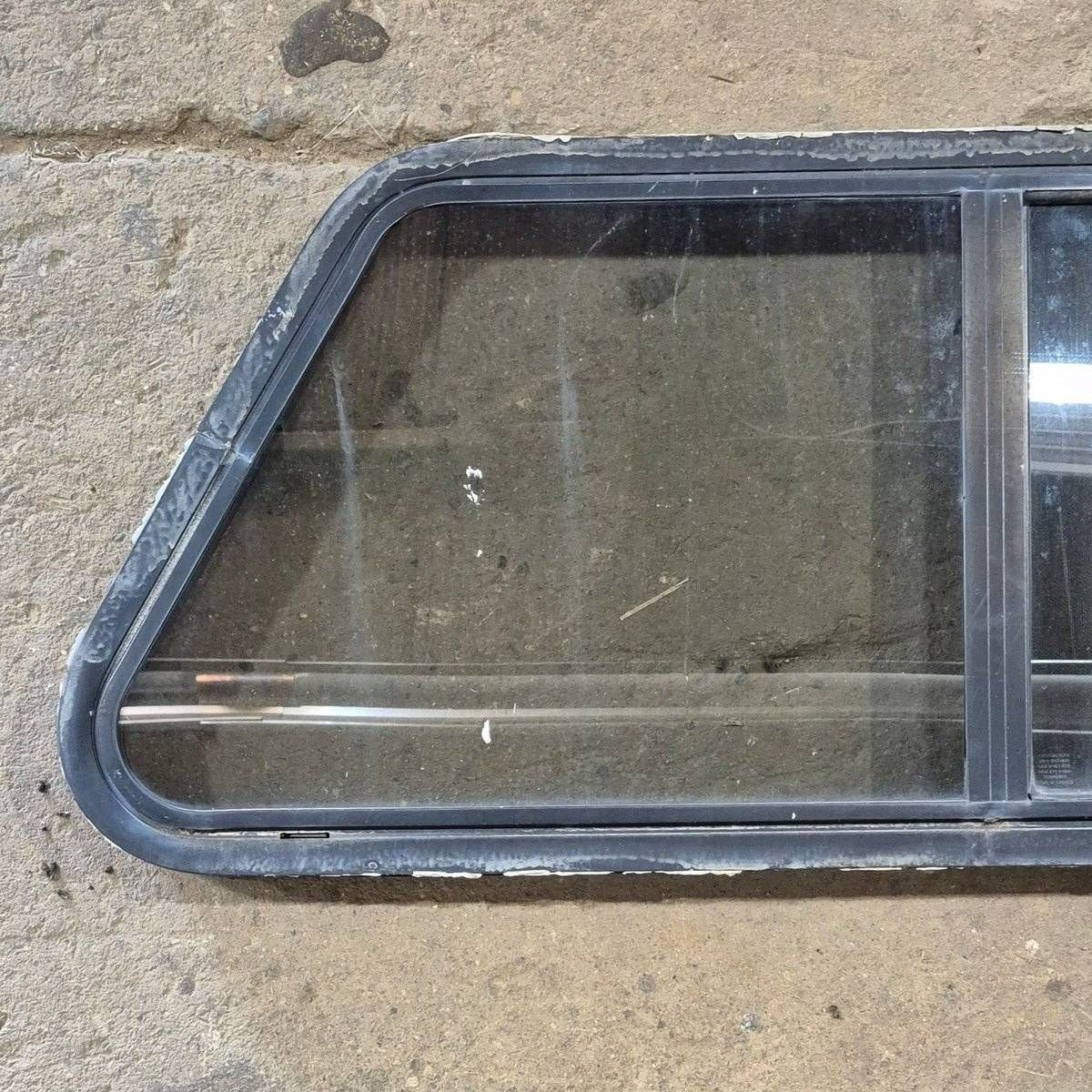 Used Slanted Black Radius Opening Window - 41 1/4" X 17 3/4" X 2" - Young Farts RV Parts
