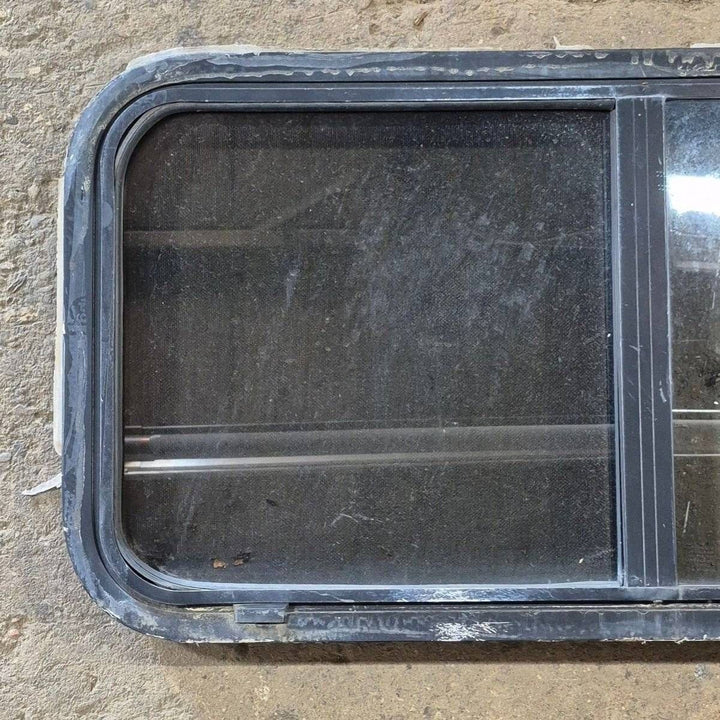 Used Slanted Black Radius Opening Window - 41 1/4" X 17 3/4" X 2" - Young Farts RV Parts