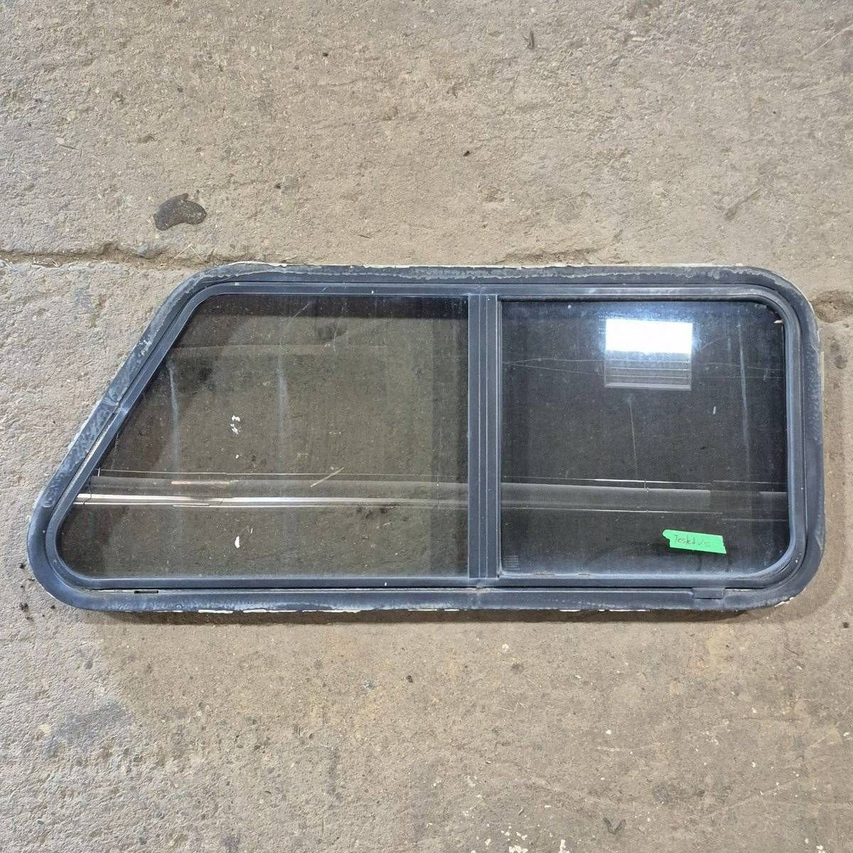 Used Slanted Black Radius Opening Window - 41 1/4" X 17 3/4" X 2" - Young Farts RV Parts