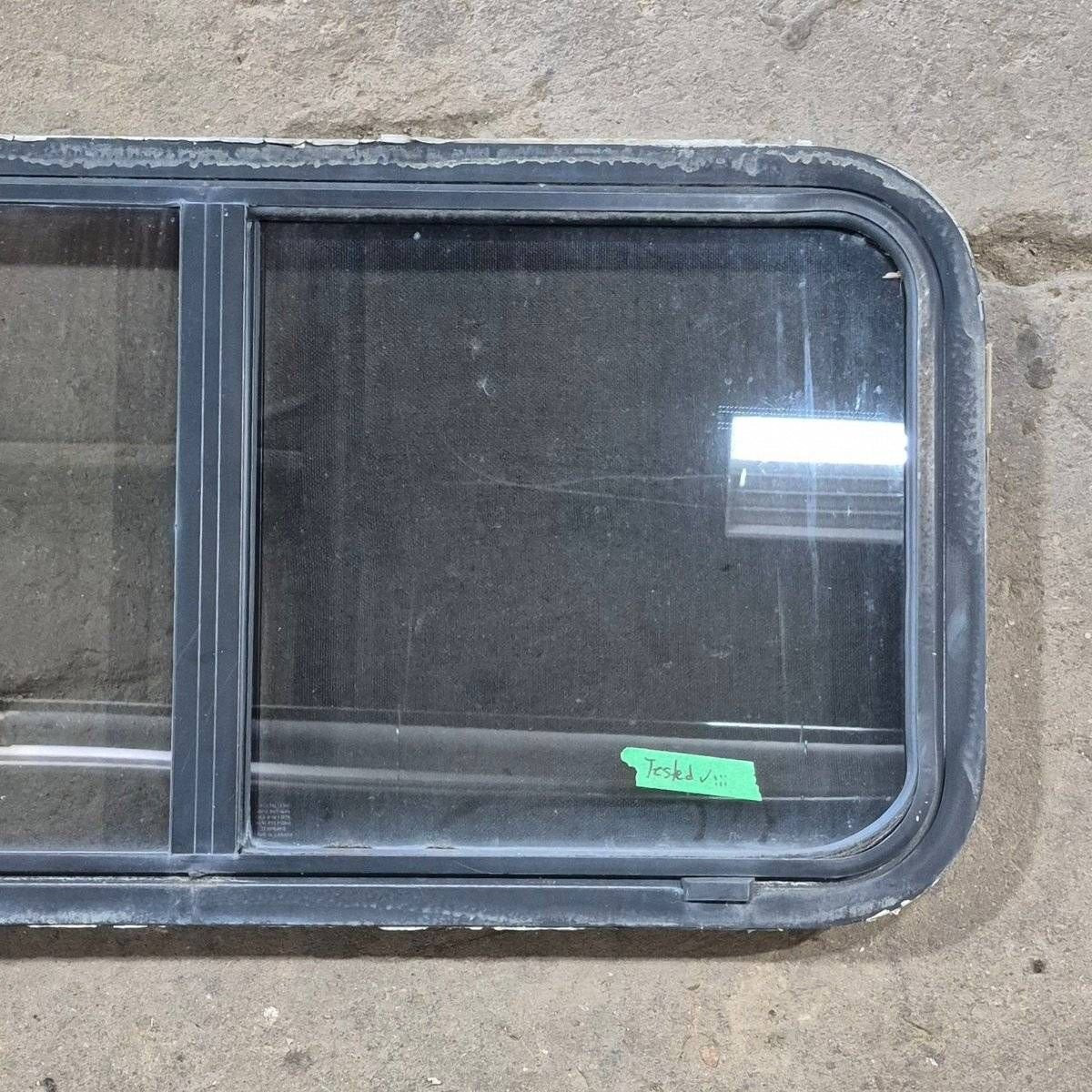 Used Slanted Black Radius Opening Window - 41 1/4" X 17 3/4" X 2" - Young Farts RV Parts