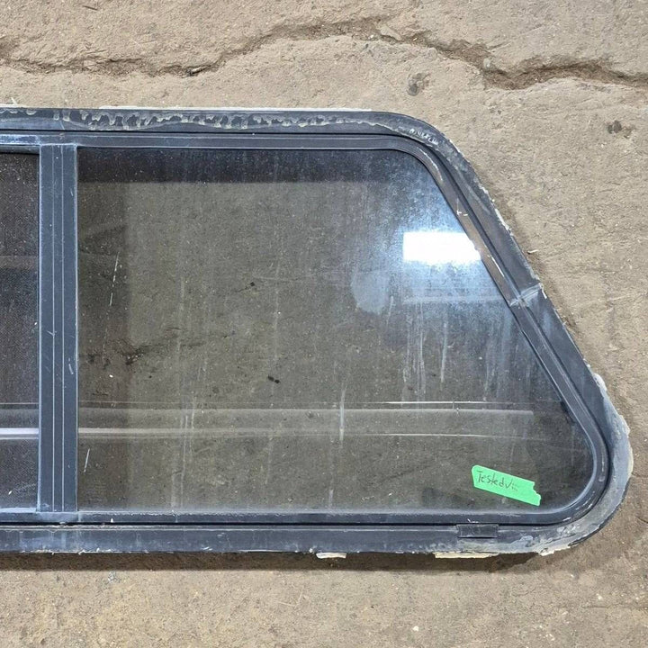 Used Slanted Black Radius Opening Window - 41 1/4" X 17 3/4" X 2" - Young Farts RV Parts