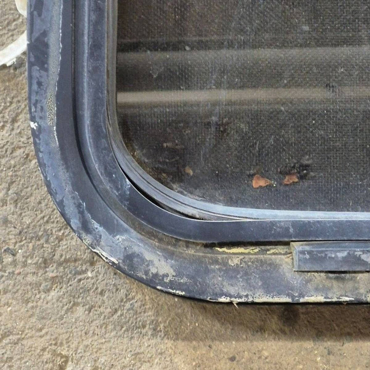 Used Slanted Black Radius Opening Window - 41 1/4" X 17 3/4" X 2" - Young Farts RV Parts