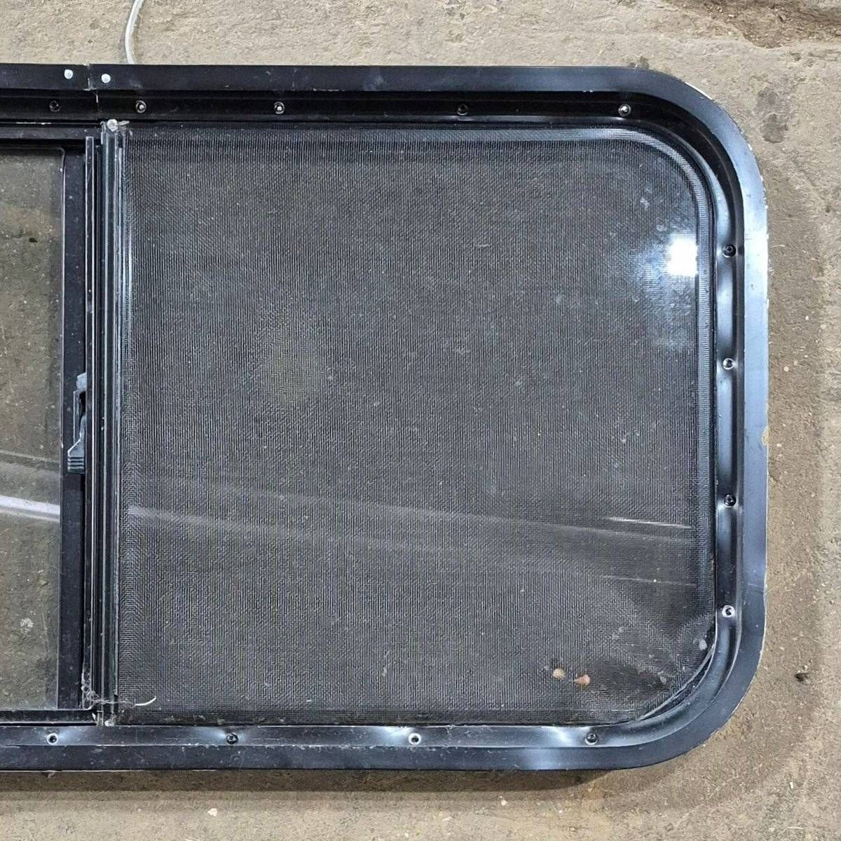 Used Slanted Black Radius Opening Window - 41 1/4" X 17 3/4" X 2" - Young Farts RV Parts