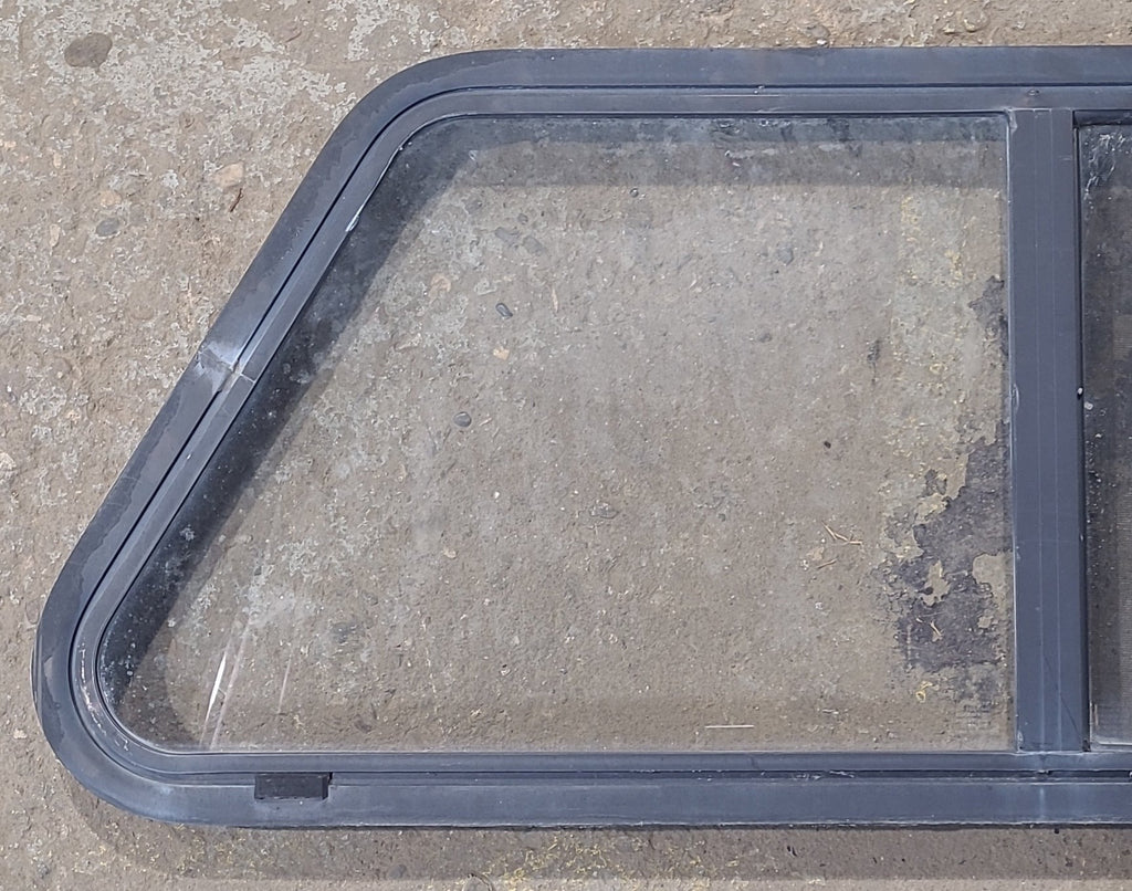 Used Slanted Black Radius Opening Window : 41 3/4" W x 17 3/4" H x 1 7/8" D - Young Farts RV Parts