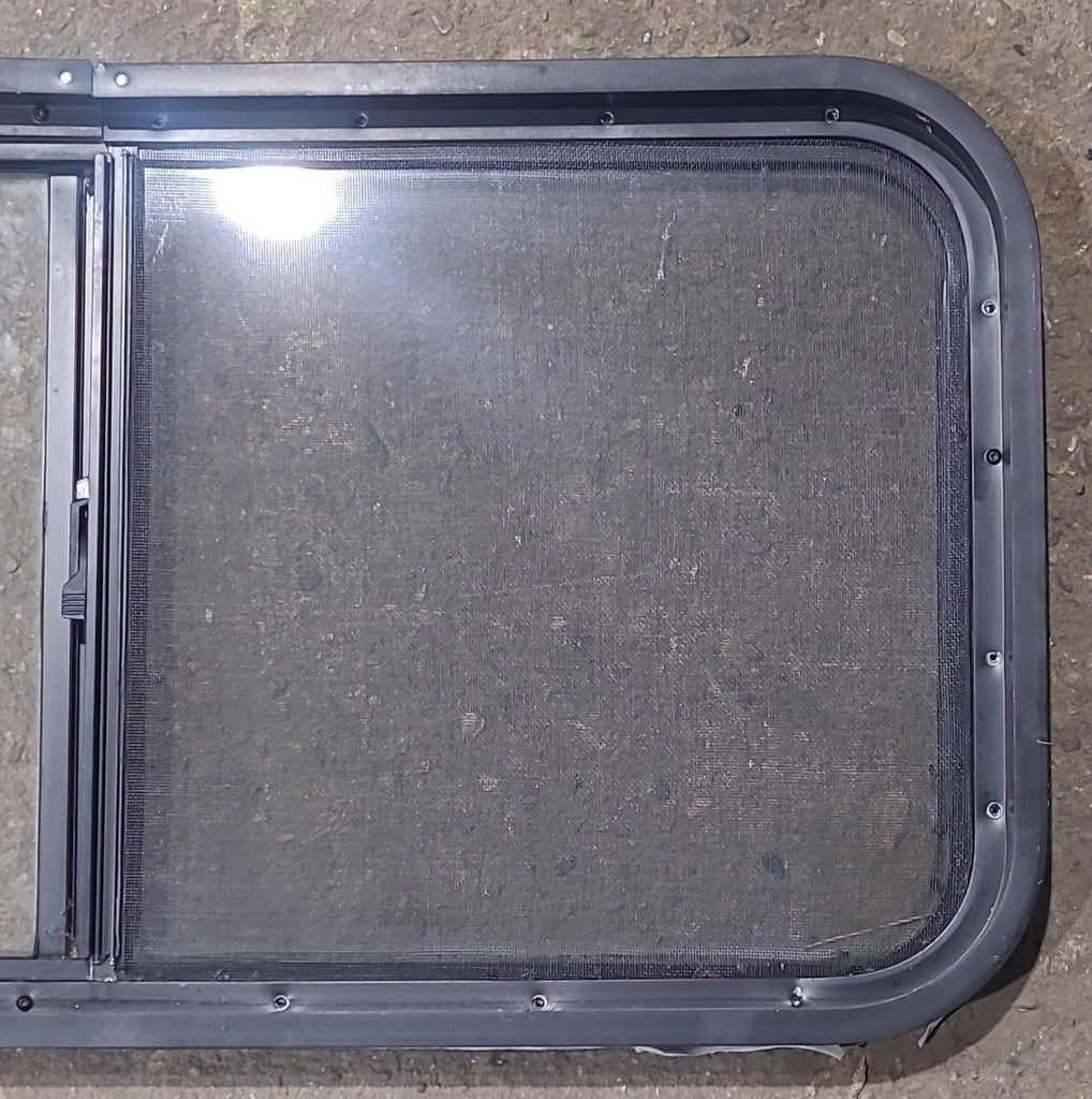 Used Slanted Black Radius Opening Window : 41 3/4" W x 17 3/4" H x 1 7/8" D - Young Farts RV Parts