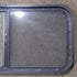 Used Slanted Black Radius Opening Window : 41 3/4" W x 17 3/4" H x 1 7/8" D - Young Farts RV Parts