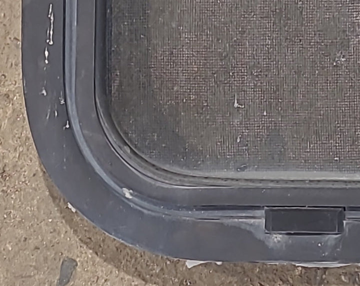 Used Slanted Black Radius Opening Window : 41 3/4" W x 17 3/4" H x 1 7/8" D - Young Farts RV Parts