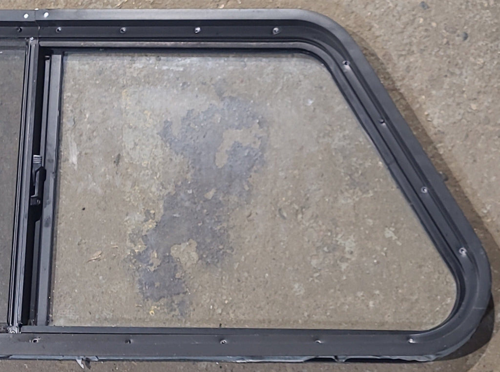 Used Slanted Black Radius Opening Window : 41 3/4" W x 17 3/4" H x 1 7/8" D - Young Farts RV Parts