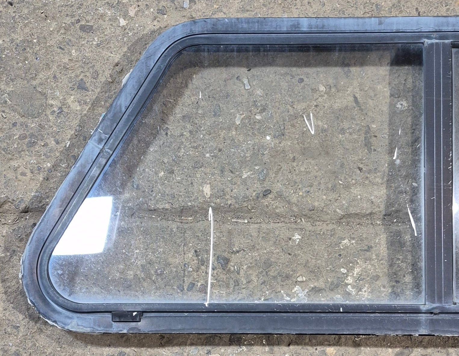 Used Slanted Black Radius Opening Window : 41 3/4" W x 17 3/4" H x 2" D - Young Farts RV Parts