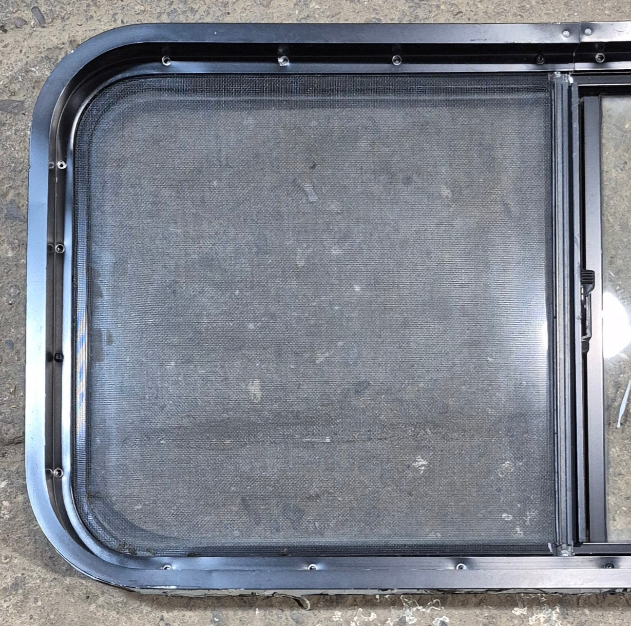 Used Slanted Black Radius Opening Window : 41 3/4" W x 17 3/4" H x 2" D - Young Farts RV Parts