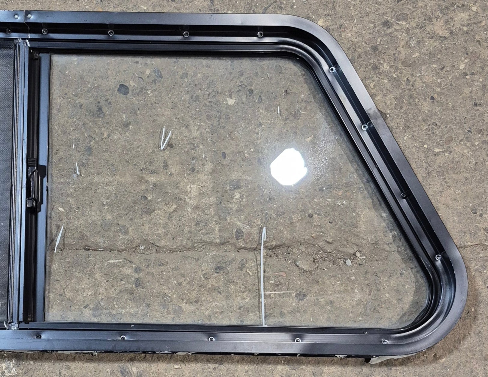 Used Slanted Black Radius Opening Window : 41 3/4" W x 17 3/4" H x 2" D - Young Farts RV Parts