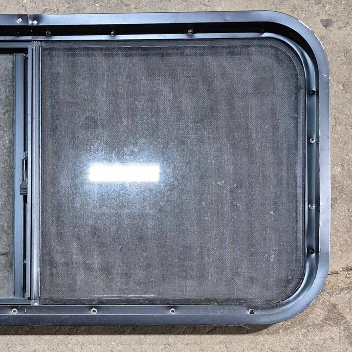 Used Slanted Black Radius Opening Window - 41.75" X 17 1/2" X 1.875" - Young Farts RV Parts