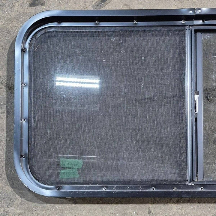 Used Slanted Black Radius Opening Window - 41.75" X 17 1/2" X 1.875" - Young Farts RV Parts