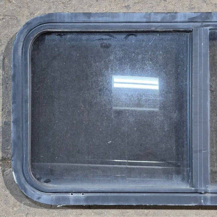 Used Slanted Black Radius Opening Window - 41.75" X 17 1/2" X 1.875" - Young Farts RV Parts