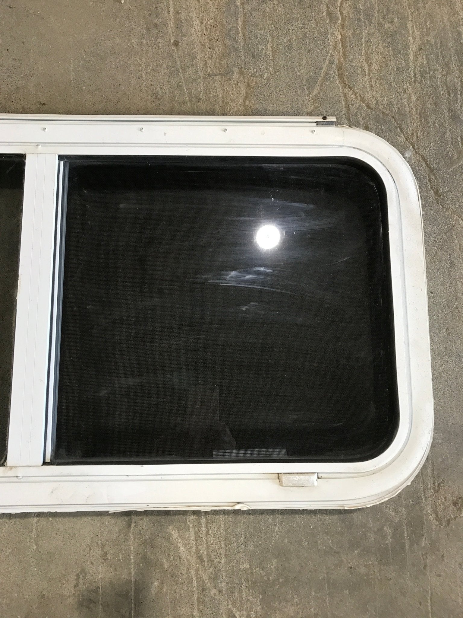 Used Slanted White Radius Emergency Opening Window : 42