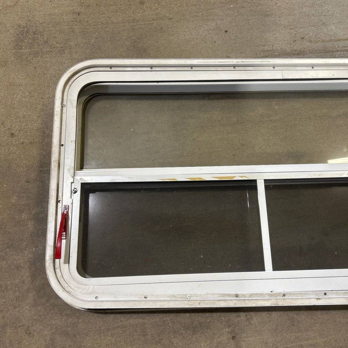 Used Slanted White Radius Emergency Opening Window - 49.25