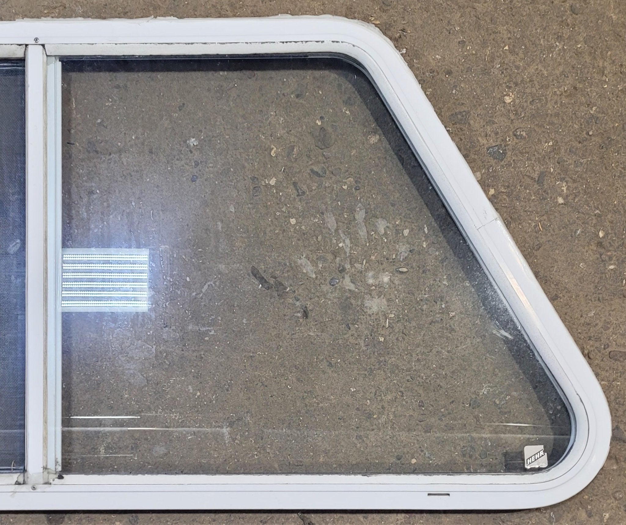 Used Slanted White Radius Opening Window : 41 1/4" W x 21 1/2" H x 1 1/4" D - Young Farts RV Parts