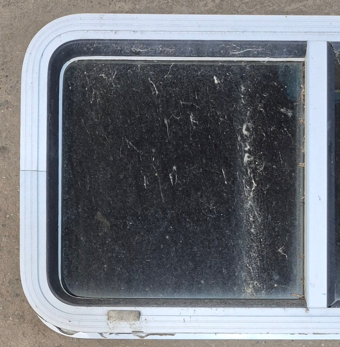 Used Slanted White Radius Opening Window : 42" W x 17 1/2" H x 1 7/8" D - Young Farts RV Parts