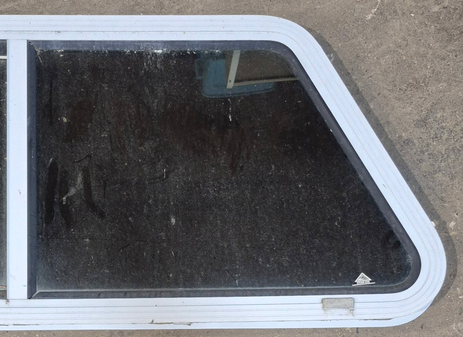 Used Slanted White Radius Opening Window : 42" W x 17 1/2" H x 1 7/8" D - Young Farts RV Parts