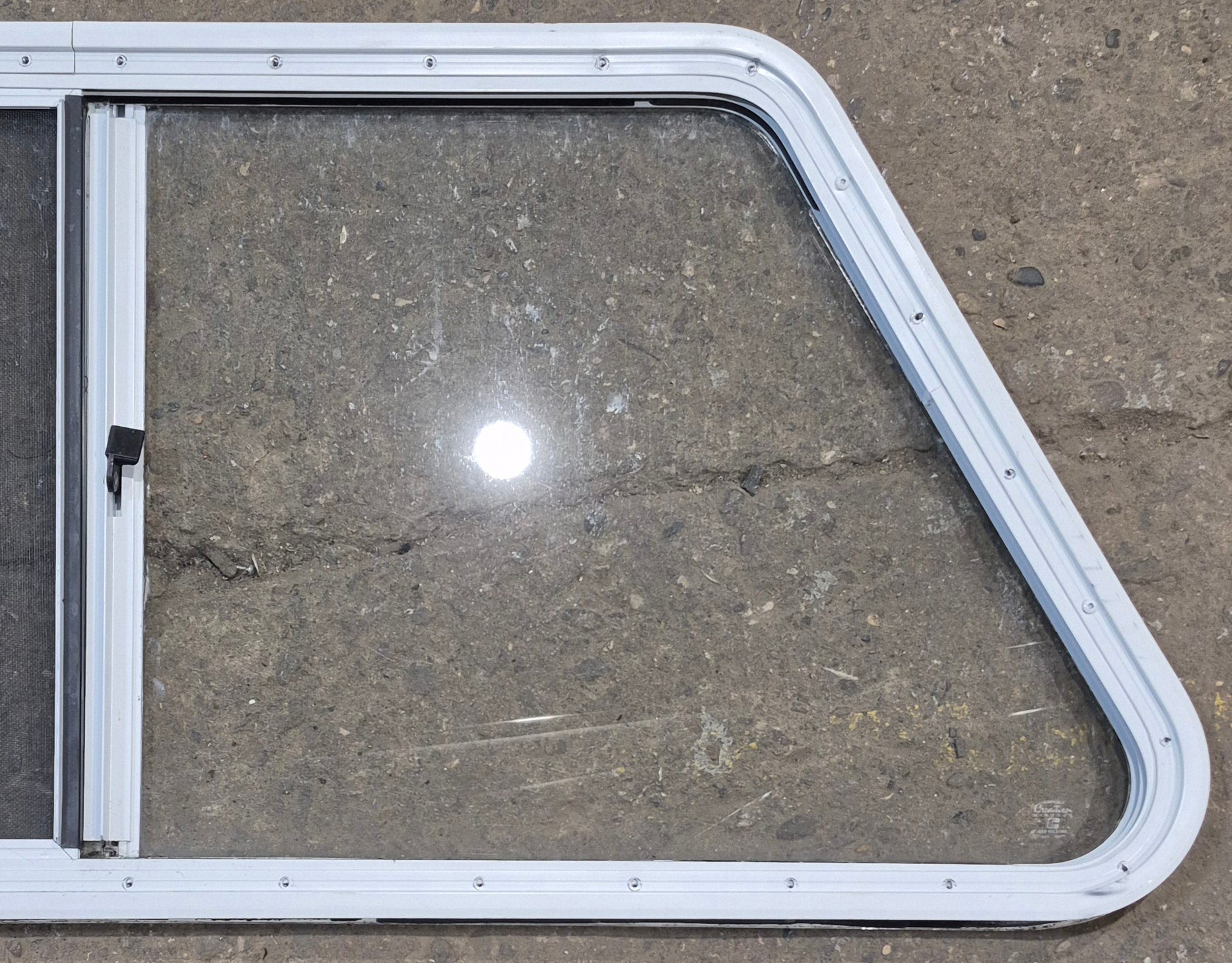 Used Slanted White Radius Opening Window : 46 3/4" W x 21 1/4" H x 1 1/4" D - Young Farts RV Parts