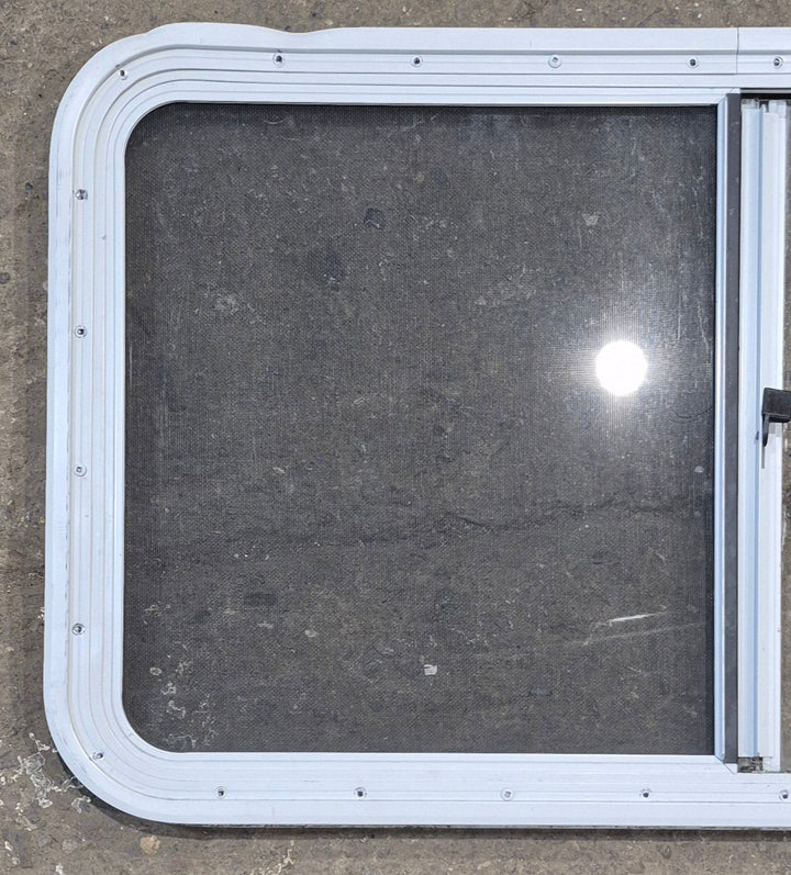 Used Slanted White Radius Opening Window : 46 3/4" W x 21 1/4" H x 1 1/4" D - Young Farts RV Parts