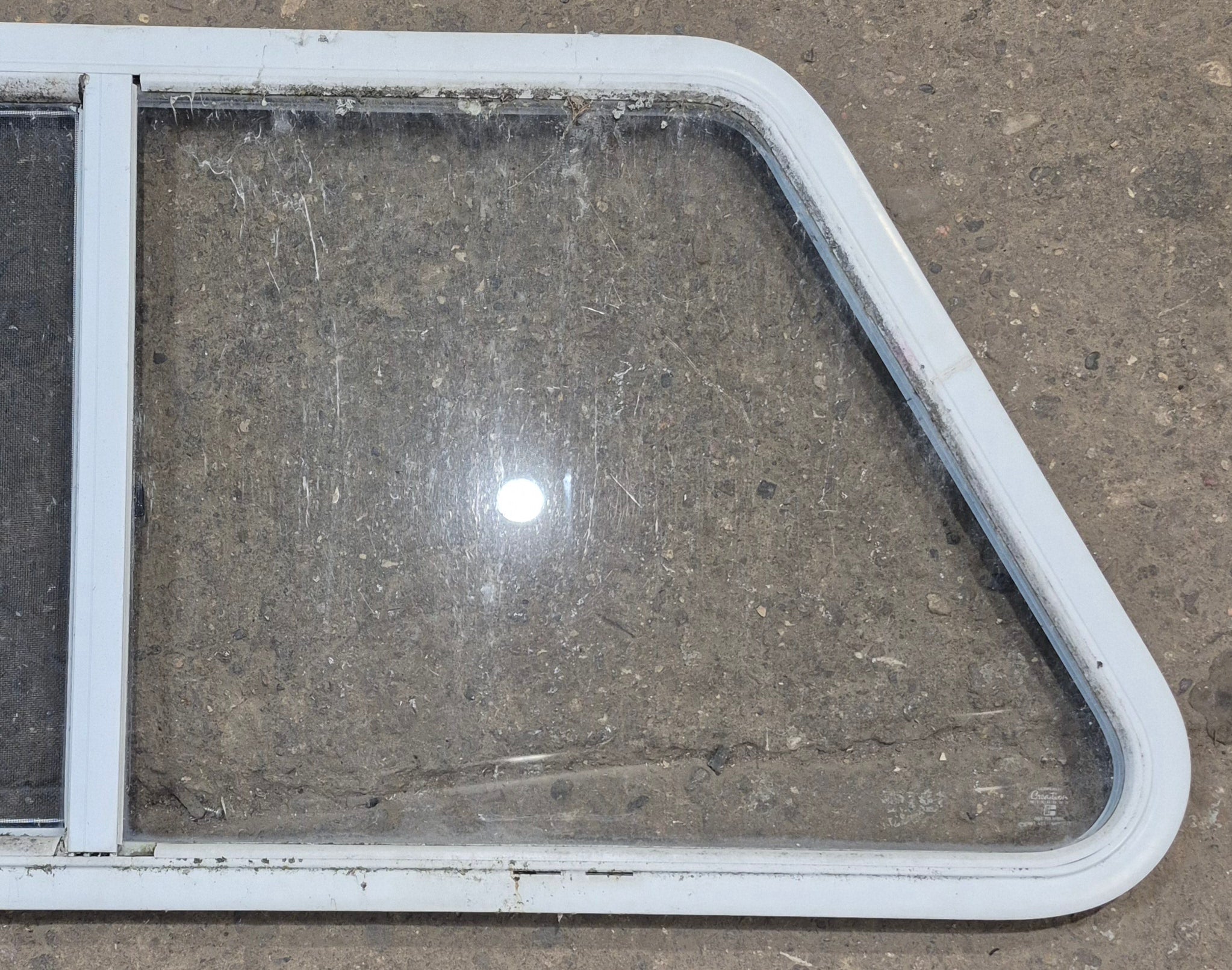 Used Slanted White Radius Opening Window : 46 3/4" W x 21 1/4" H x 1 1/4" D - Young Farts RV Parts