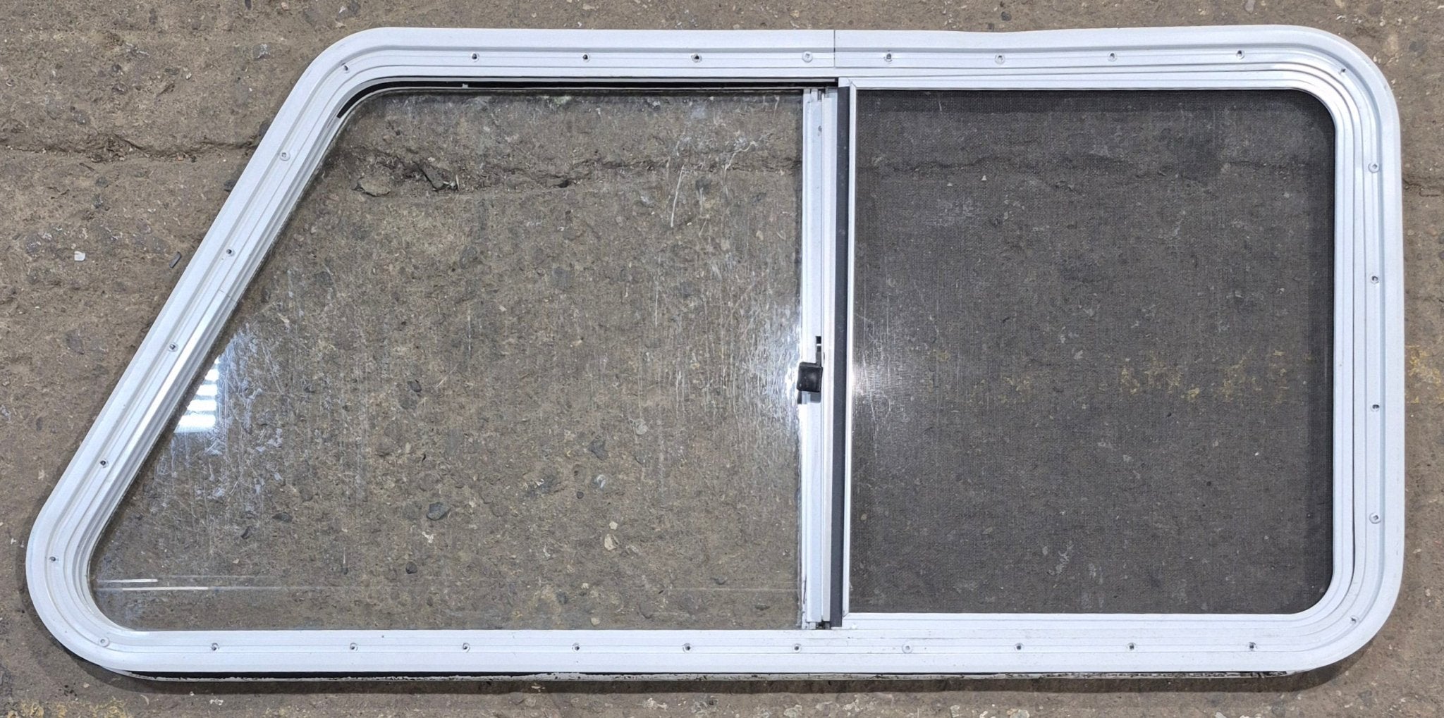 Used Slanted White Radius Opening Window : 46 3/4" W x 21 1/4" H x 1 1/4" D - Young Farts RV Parts