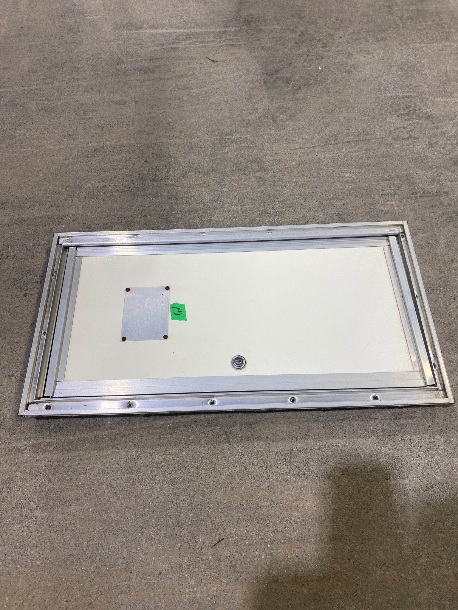 Used Square Cornered Cargo Door 10 1/2" W x 22 1/2 H x 1" D - Young Farts RV Parts