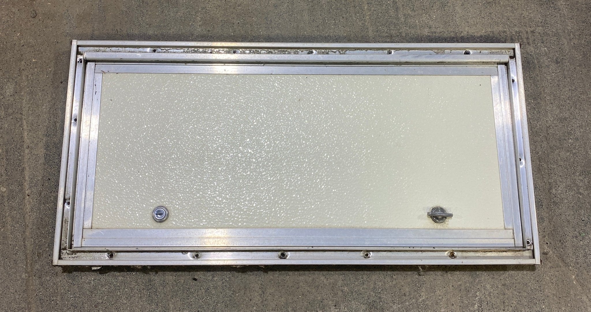 Used Square Cornered Cargo Door 23 1/2" W x 10 1/2" H X 1" D - Young Farts RV Parts
