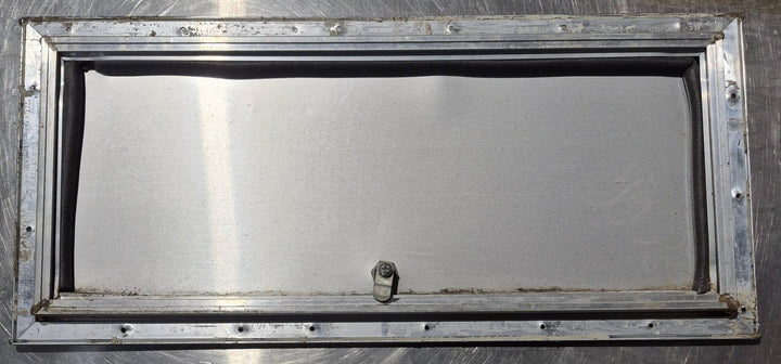 Used Square Cornered Cargo Door 23 7/8" x 9 3/4" x 5/8" D - Young Farts RV Parts