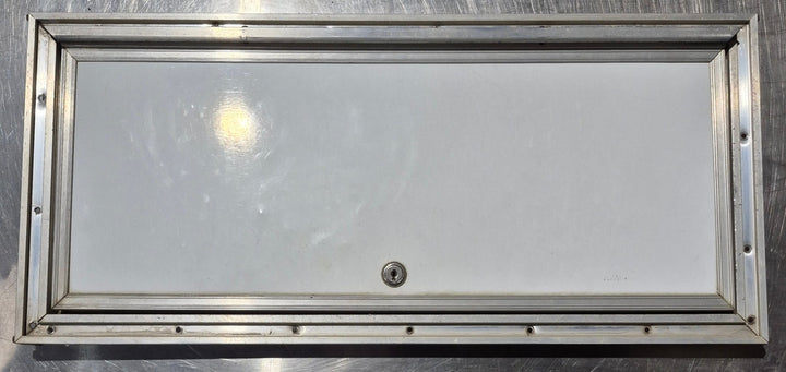 Used Square Cornered Cargo Door 23 7/8" x 9 3/4" x 5/8" D - Young Farts RV Parts