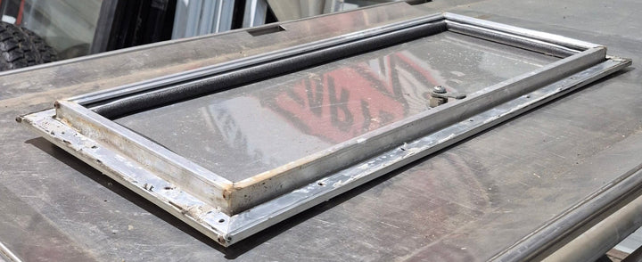 Used Square Cornered Cargo Door 23 7/8" x 9 3/4" x 5/8" D - Young Farts RV Parts