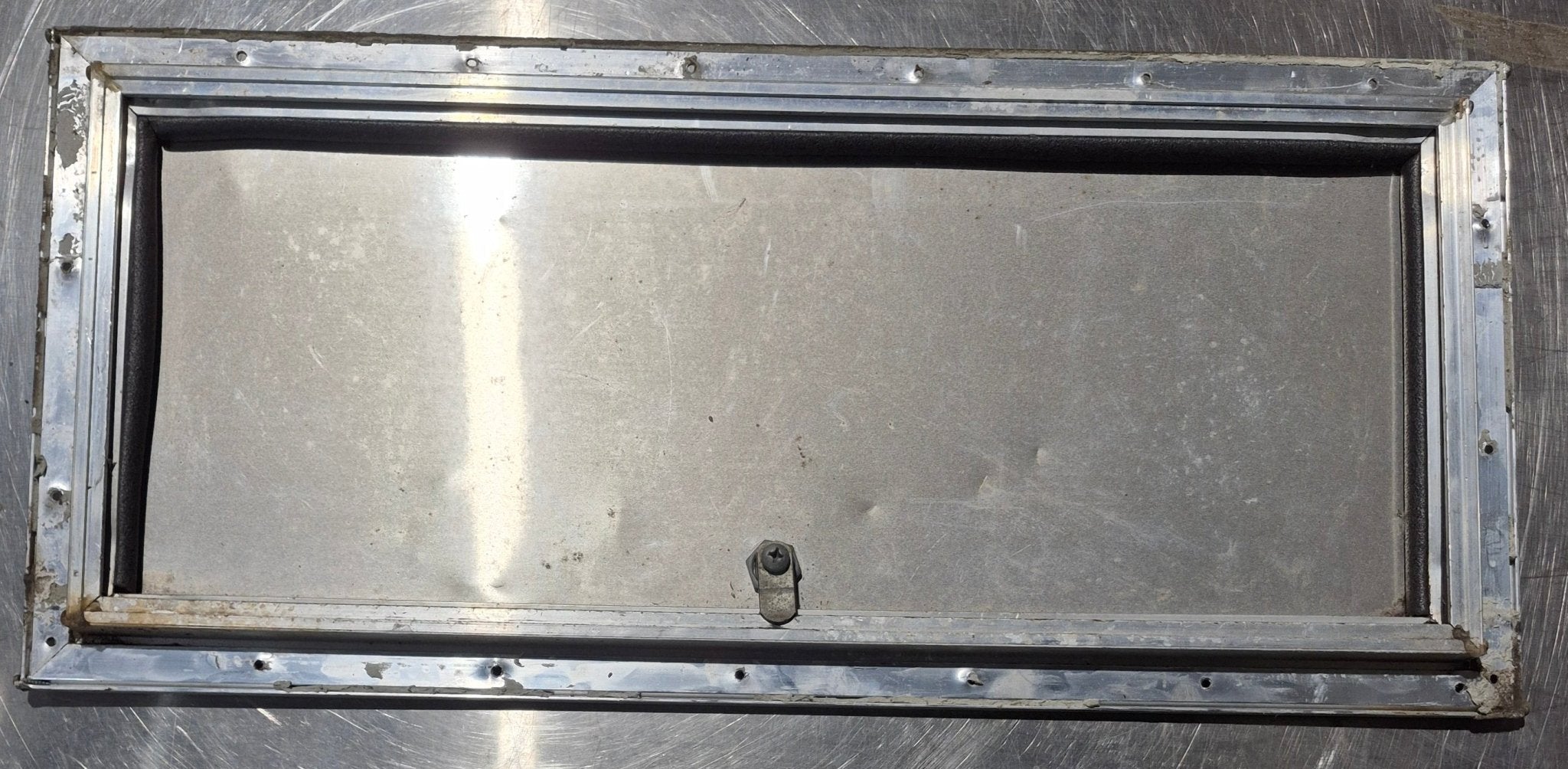 Used Square Cornered Cargo Door 23 7/8" x 9 3/4" x 5/8" D - Young Farts RV Parts