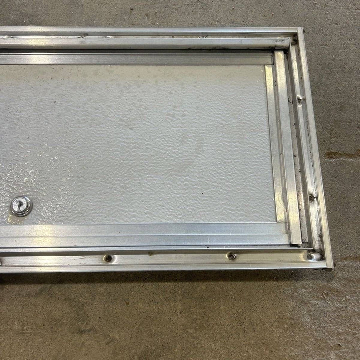 Used Square Cornered Cargo Door - 23.0 X 9.25 X 0.625 - Young Farts RV Parts