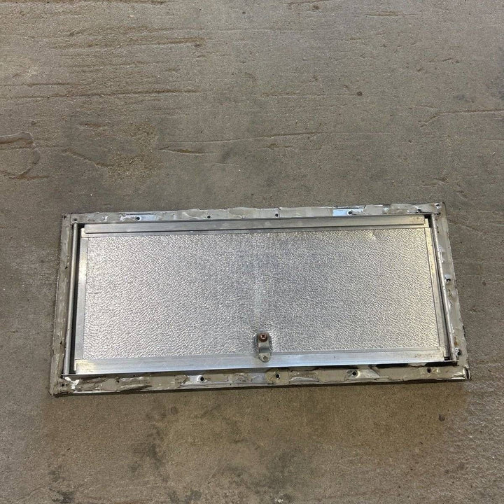 Used Square Cornered Cargo Door - 23.0 X 9.25 X 0.625 - Young Farts RV Parts