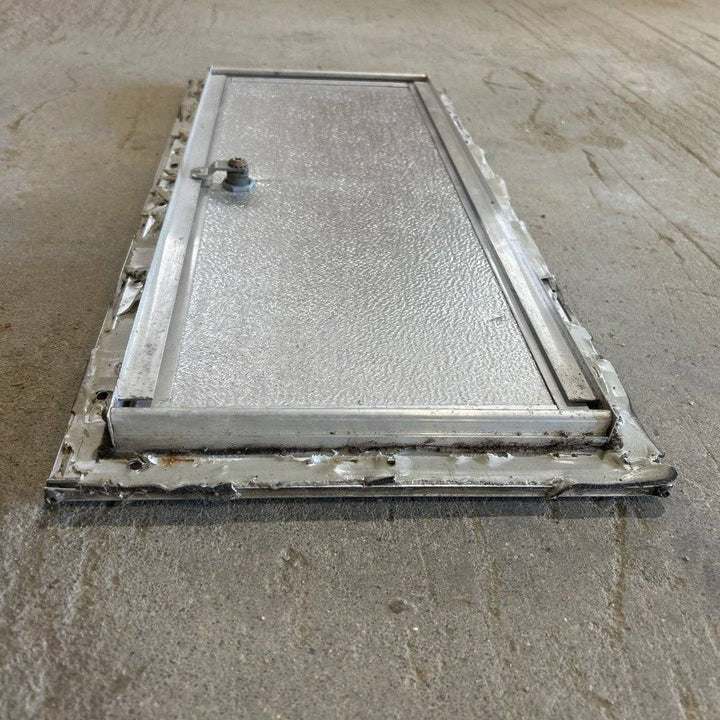 Used Square Cornered Cargo Door - 23.0 X 9.25 X 0.625 - Young Farts RV Parts
