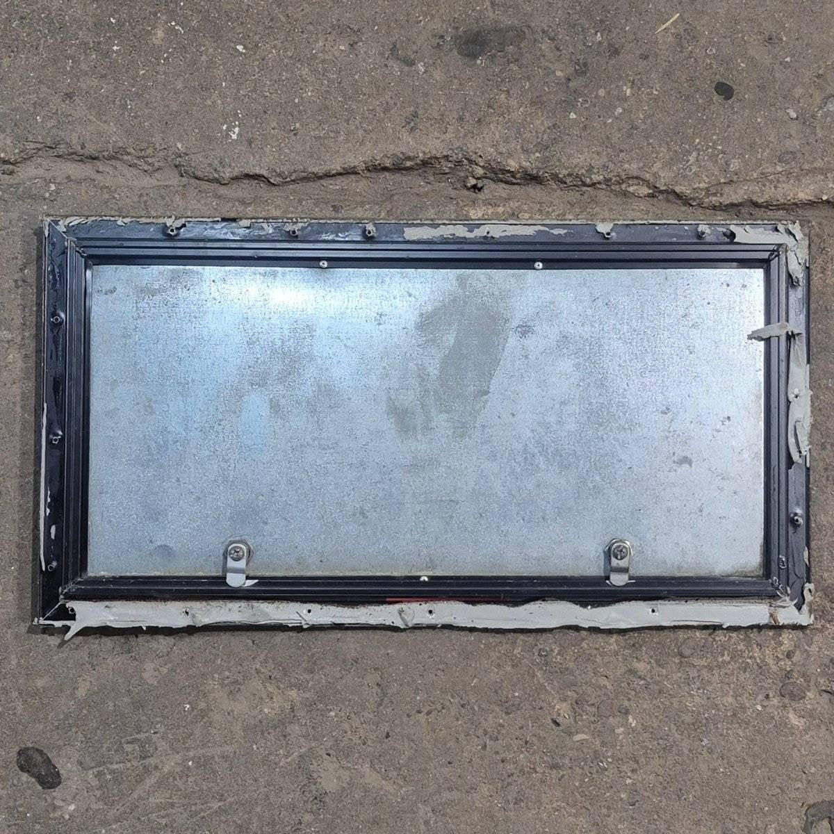 Used Square Cornered Cargo Door - 23.875 X 11.75 X 0.625 - Young Farts RV Parts