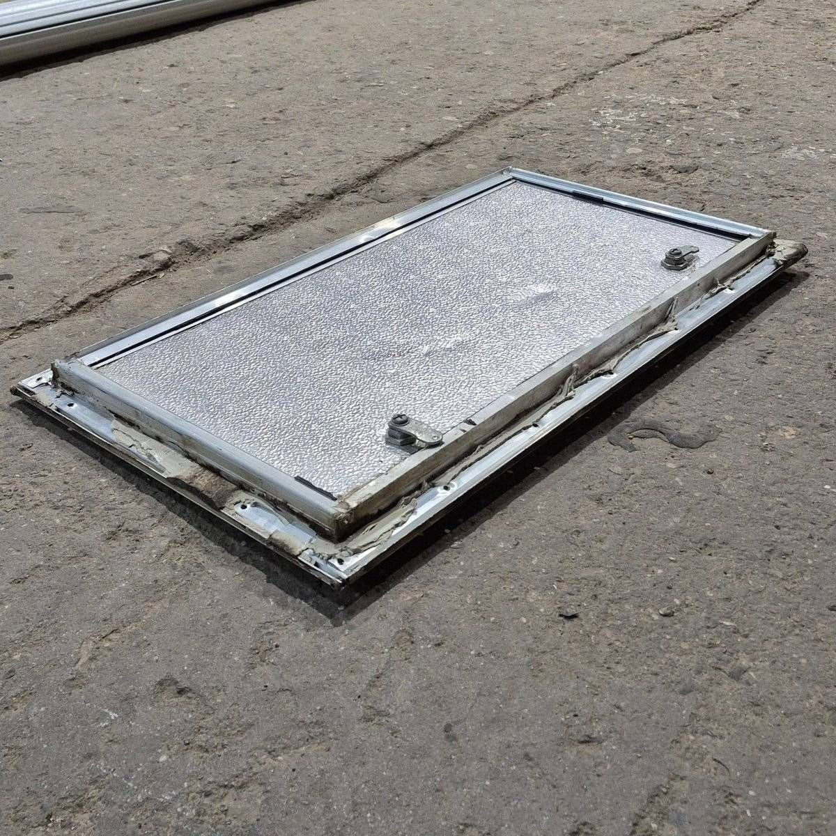 Used Square Cornered Cargo Door - 23.875 X 12.625 X 0.625 - Young Farts RV Parts