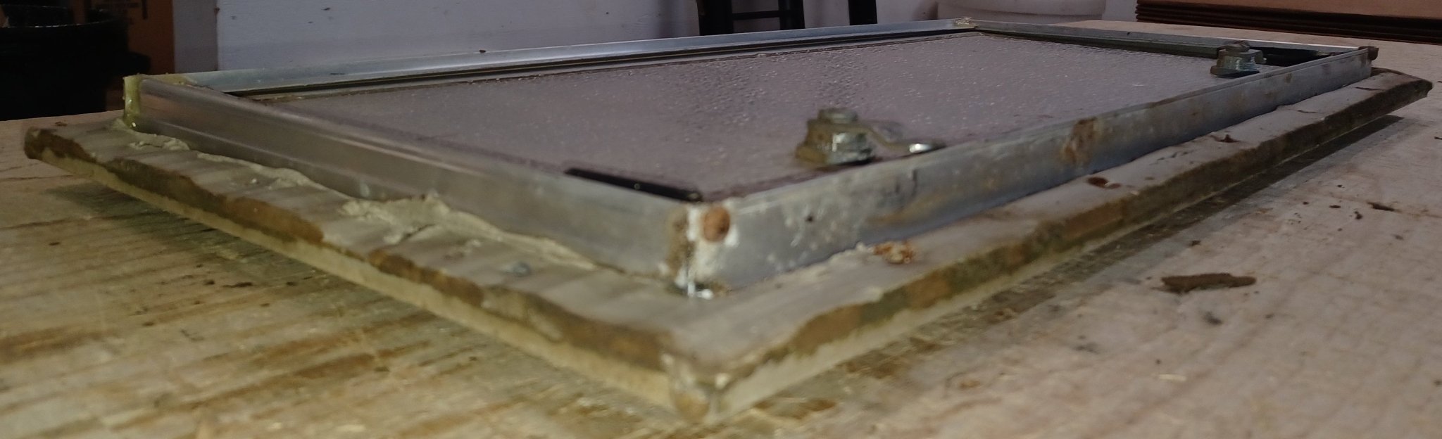 Used Square Cornered Cargo Door 24" x 10 1/2" x 7/8" - Young Farts RV Parts