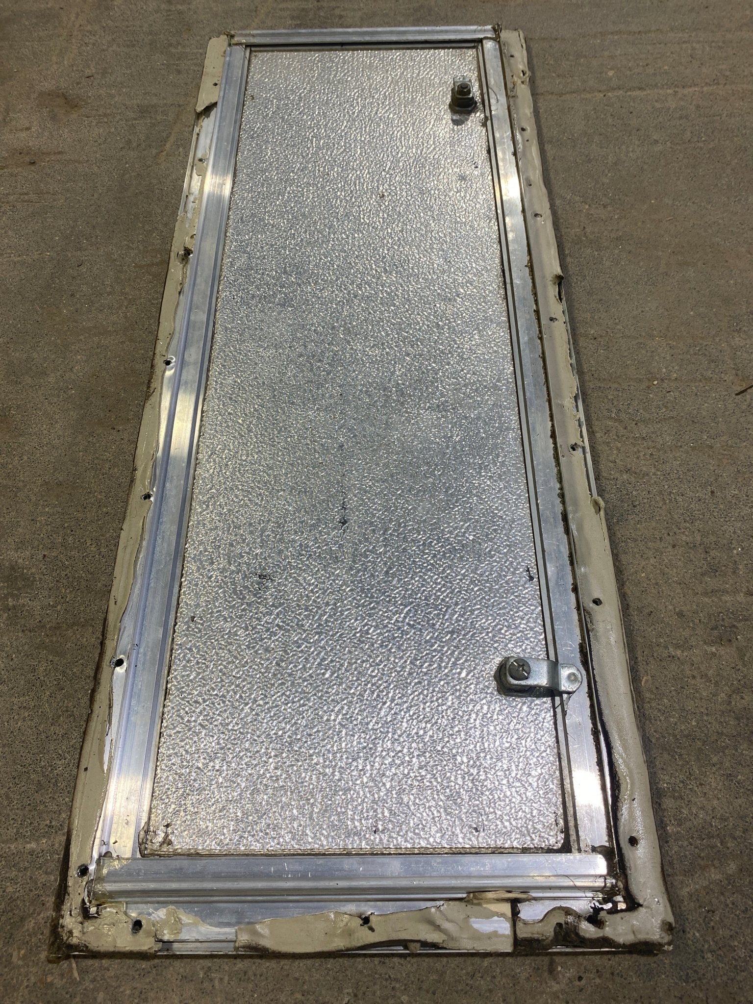 Used Square Cornered Cargo Door 29 1/2" W x 10 1/4" H X 1" D - Young Farts RV Parts